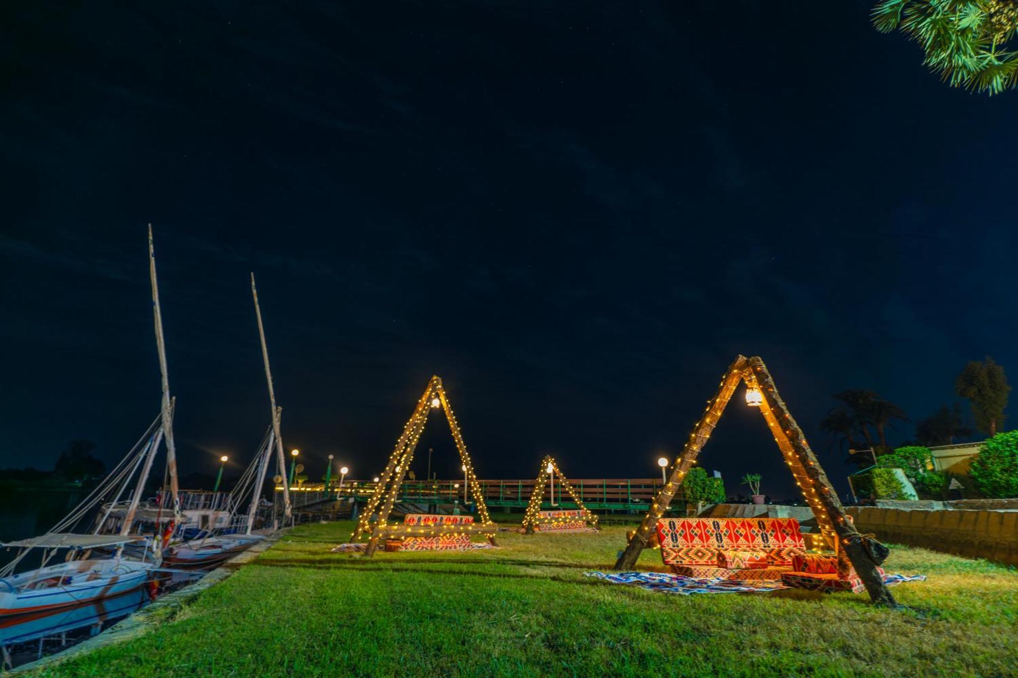 Jolie Ville Hotel & Spa Kings Island Луксор Екстер'єр фото The bridge at night